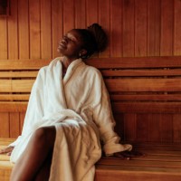 young black woman enjoying in sauna. - travel stock pictures, royalty-free photos & images