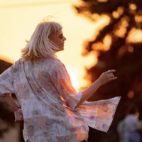 young carefree having fun while dancing on a music festival at sunset.. - concert stock pictures, royalty-free photos & images