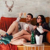 young couple eating chinese take-away food at home - junk food stock pictures, royalty-free photos & images