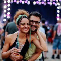 young couple enjoying favorite band at music festival. - concert stock pictures, royalty-free photos & images