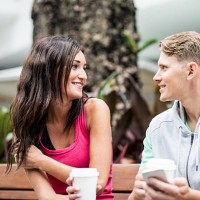 young couple looking some pictures on social networks - junk food stock pictures, royalty-free photos & images