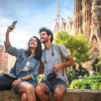 young couple taking break from sightseeing for selfie - travel stock pictures, royalty-free photos & images