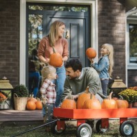 young family preparing for halloween - garden decoration stock pictures, royalty-free photos & images