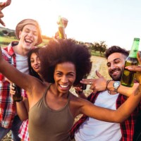 young friends enjoying the freedom on a car trip over a country offroad - concert stock pictures, royalty-free photos & images