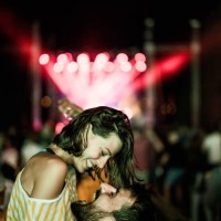 young happy couple having fun on music concert. - concert stock pictures, royalty-free photos & images