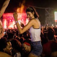 young happy couples having fun on music festival by night. - concert stock pictures, royalty-free photos & images
