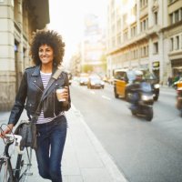 young hipster woman in the streets of barcelona commuting. - junk food stock pictures, royalty-free photos & images