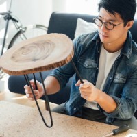 young man doing diy, making a stool at home - home decoration stock pictures, royalty-free photos & images