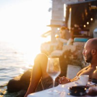 young man enjoying the summertime by the sea - food stock pictures, royalty-free photos & images