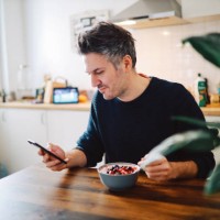 young man having a healthy breakfast - food stock pictures, royalty-free photos & images