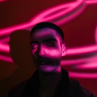 young man illuminated by neon lights - fashion stock pictures, royalty-free photos & images