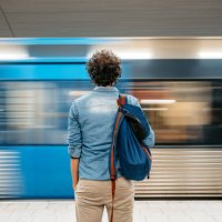 young man waiting for a subway train in stockholm - travel stock pictures, royalty-free photos & images