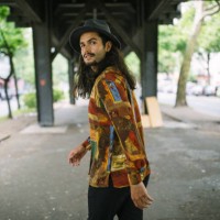 young man walking under the bridge in city - fashion stock pictures, royalty-free photos & images