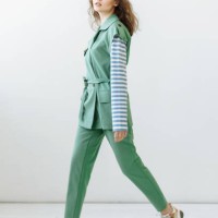 young model woman walking against white wall background in studio - fashion stock pictures, royalty-free photos & images