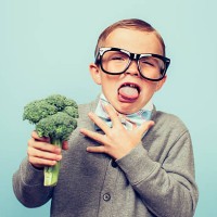 young nerd boy hates eating broccoli - food stock pictures, royalty-free photos & images