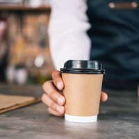 young owner of coffee cafe service customer. - junk food stock pictures, royalty-free photos & images