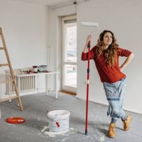 young pregnant woman painting nursery room - home decoration stock pictures, royalty-free photos & images