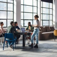 young professionals collaborating in a modern co-working space - fashion stock pictures, royalty-free photos & images