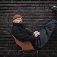 young stylish man in the black trendy outfit - fashion stock pictures, royalty-free photos & images