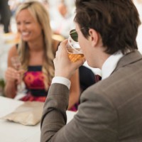 young trendy male drinking in a marquee - home decoration stock pictures, royalty-free photos & images