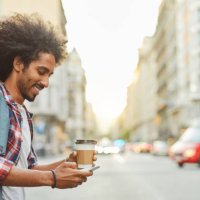 young trendy man in barcelona. - junk food stock pictures, royalty-free photos & images
