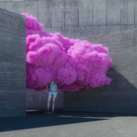 young woman brainstorming in pink cloud - fashion stock pictures, royalty-free photos & images