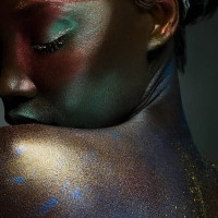 young woman covered in metallic make up - fashion stock pictures, royalty-free photos & images