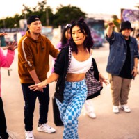 young woman dancing hip hop during street party with her friends - concert stock pictures, royalty-free photos & images