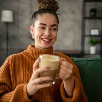 young woman drinking coffee in the morning - coffee stock pictures, royalty-free photos & images