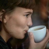 young woman drinking cup of coffee - coffee stock pictures, royalty-free photos & images