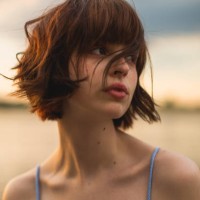 young woman enjoying sunset. - fashion stock pictures, royalty-free photos & images