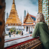 young woman exploring the grand palace in bangkok - travel stock pictures, royalty-free photos & images