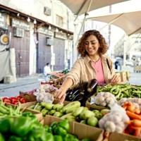 young woman grocery shopping at outdoor market - food stock pictures, royalty-free photos & images