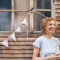 young woman having fun at a barbecue party, drinking beer - garden decoration stock pictures, royalty-free photos & images