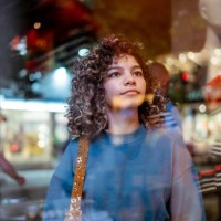 young woman looking at clothing store - fashion stock pictures, royalty-free photos & images