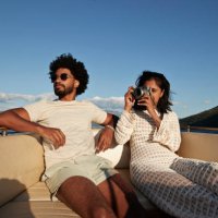 young woman photographing on camera by boyfriend - travel stock-fotos und bilder