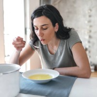 young woman sick at home - food stock pictures, royalty-free photos & images