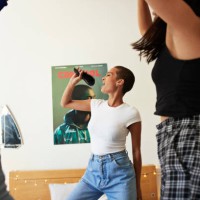 young woman singing and dancing with friends - fashion stock pictures, royalty-free photos & images