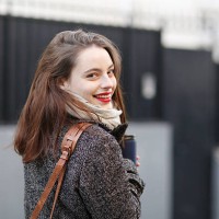 young woman walking in the street - fashion stock pictures, royalty-free photos & images