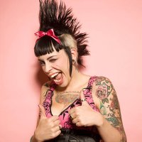 young woman with tattoos giving the thumbs-up - hairstyle stock pictures, royalty-free photos & images