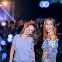 young women enjoying a concert - concert stock pictures, royalty-free photos & images
