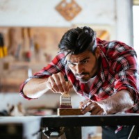 young worker in workshop - home decoration stock pictures, royalty-free photos & images
