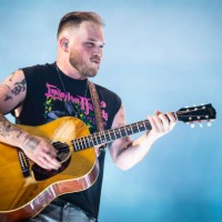 Zach Bryan performs during the Quittin Time tour at Nissan Stadium on June 29, 2024 in Nashville, Tennessee.