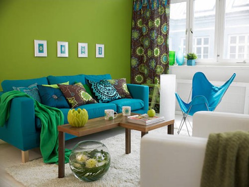 a blue sofa in a living room - home decoration stock pictures, royalty-free photos & images