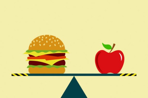 a burger and an apple on a seesaw - junk food stock pictures, royalty-free photos & images