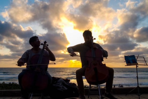 a concert at sunset in tijuana beach on the pacific mexican coast near the us-mexico border - concert stock pictures, royalty-free photos & images