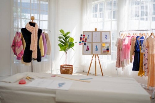 a dressmakers model in clothing design studio. - fashion stock pictures, royalty-free photos & images
