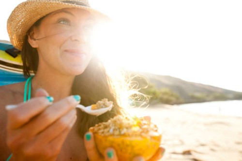 a female enjoying a day at the beach. - food stock pictures, royalty-free photos & images