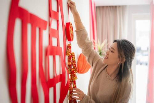 a festive touch: adorning walls with chinese new year firecracker ornaments - home decoration stock pictures, royalty-free photos & images