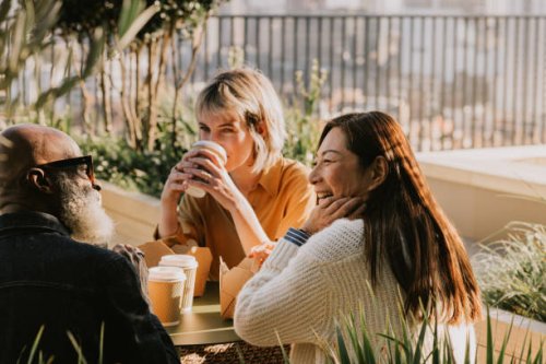 a group of coworkers enjoy an alfresco lunch - coffee stock pictures, royalty-free photos & images